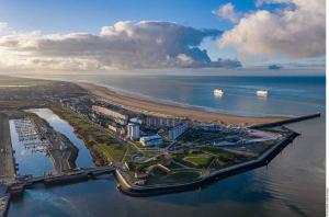 an aerial view of a city in the water at Les jardins de Romy in Calais