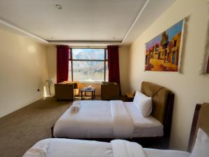 Voodi või voodid majutusasutuse Apex Hotels and Resorts Hussaini toas