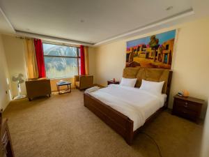 Voodi või voodid majutusasutuse Apex Hotels and Resorts Hussaini toas
