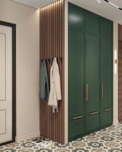 a room with green cabinets and a closet at great apartment in Madrid complex in Kirovo