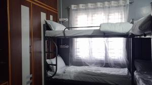 Ліжко або ліжка в номері Da Java 18 hostel and Homestay Chikmagalur