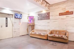 Posezení v ubytování FabHotel Classic Executive