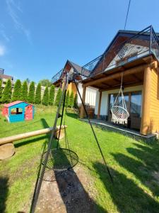Legeområdet for børn på Gorczański Resort Domek w Górach Sauna Jacuzzi