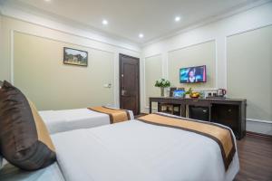 TV a/nebo společenská místnost v ubytování Hanoi Hotel & Spa
