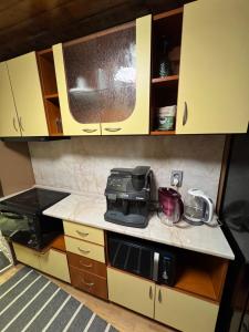 Kuchyň nebo kuchyňský kout v ubytování Danube Rose Cottage