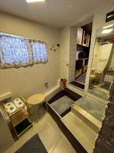 Posezení v ubytování Danube Rose Cottage