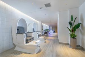 an image of a clinic with a mri machine at Awaken Da Nang Hotel in Danang