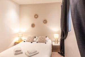 En eller flere senge i et værelse på C11 - 1 BDR Rue Meynadier 5min Palais Festivals & Sea - AC