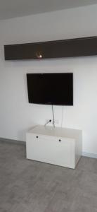 TV a/nebo společenská místnost v ubytování Pepe Apartment 40 mkw