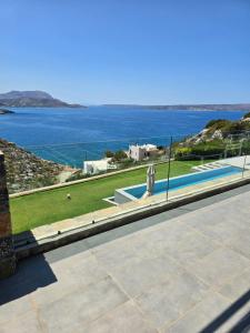 a house with a view of the water at Villa Ektoras in Plaka