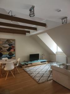 TV a/nebo společenská místnost v ubytování Uus 30 Apartments