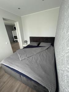 Postel nebo postele na pokoji v ubytování Rõuge Apartment
