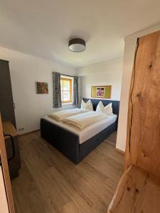 Postel nebo postele na pokoji v ubytování Apartementhaus Schöndorfer