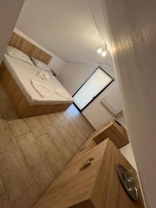 Postel nebo postele na pokoji v ubytování VILA TORETO