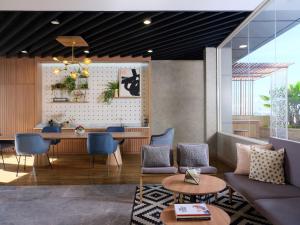 Ein Sitzbereich in der Unterkunft Fika Rooms Tangerang By Skandinavia