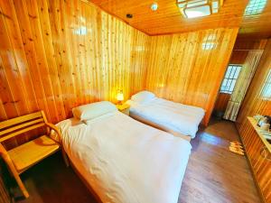 Зона вітальні в Tulou Fuyulou Changdi Inn