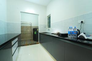 Η κουζίνα ή μικρή κουζίνα στο SIGNATURE HOMES LUXURY SERVICE APARTMENT