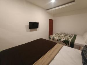 Postel nebo postele na pokoji v ubytování Attara Inn Senggigi