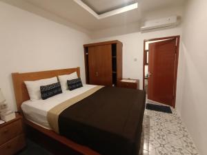 Postel nebo postele na pokoji v ubytování Attara Inn Senggigi