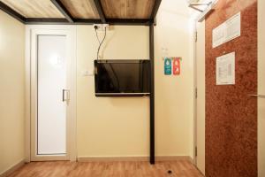 TV a/nebo společenská místnost v ubytování Fragrance Hotel - Balestier