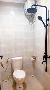 Koupelna v ubytování Adhi Homestay
