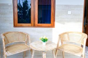 Posezení v ubytování Adhi Homestay
