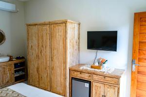 Kuchyň nebo kuchyňský kout v ubytování Adhi Homestay