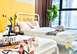 Ένα ή περισσότερα κρεβάτια σε δωμάτιο στο Atlantis Residence l 6-10 pax l Luxury 2 BR l Jonker St l City Centre by Jay Stay Management +207 φωτογραφίες