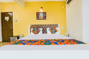 Postel nebo postele na pokoji v ubytování Via Dewa - Nr Dabolim Airport