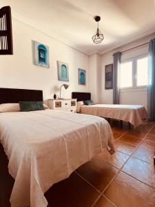 Postel nebo postele na pokoji v ubytování Casa Energía del Cabo. San Jose Cabo de Gata. + 37 fotografií