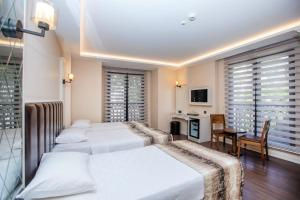 Ένα ή περισσότερα κρεβάτια σε δωμάτιο στο PRAG HOTEL +21 φωτογραφίες