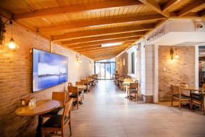 TV a/nebo společenská místnost v ubytování Opatija Hotel