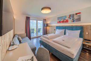 Katil atau katil-katil dalam bilik di Hotel Winterer