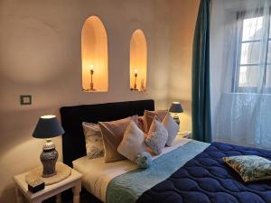 Postel nebo postele na pokoji v ubytování Les Terrasses d'Essaouira - Yoga Studio