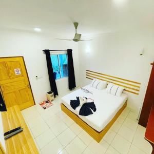 Postel nebo postele na pokoji v ubytování Sunny Beach Thoddoo
