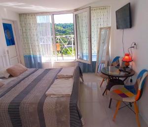 Letto o letti in una camera di Sighnaghi Art Hotel