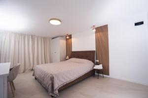 Postel nebo postele na pokoji v ubytování Denta Suport + 7 fotografií