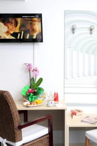 TV a/nebo společenská místnost v ubytování Hotel Anapaya