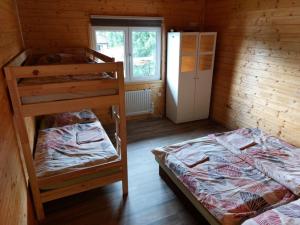 Postel nebo postele na pokoji v ubytování Chata Tereza