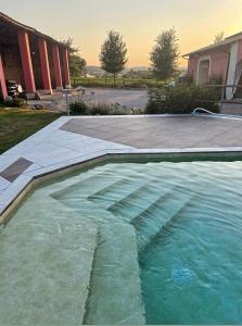 The swimming pool at or close to La Valle dei Vigher
