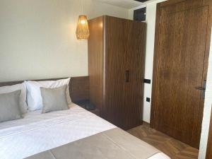 Кровать или кровати в номере Now Boutique Hotel