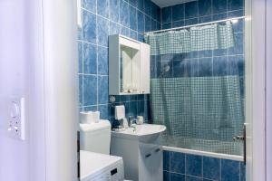 Ванная комната в Apartman Rest 'n' Go +11 фотографий