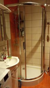 a bathroom with a shower and a sink at nice home in Warsaw