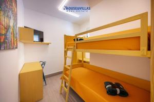 Un pat sau paturi într-o cameră la House&Villas - La Casa dei colori