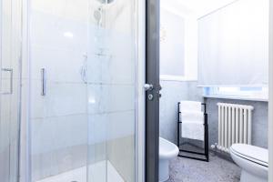 a bathroom with a shower and a toilet at Città Studi Suites - Top Collection in Milan