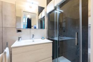 a bathroom with a sink and a shower at Città Studi Suites - Top Collection in Milan