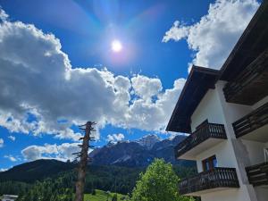 a view of the mountains from a building at Nord Hotel in Cortina dʼAmpezzo