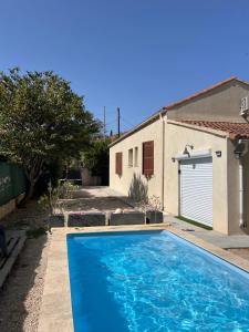 Πισίνα στο ή κοντά στο Appartement proche de la mer