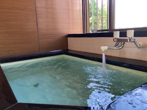 Swimming pool sa o malapit sa 安曇野市穂高温泉郷Vila湯仙望