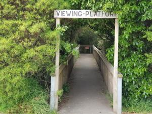 a sign that reads viewing platform on a bridge at Private room in homestay in Ashhurst